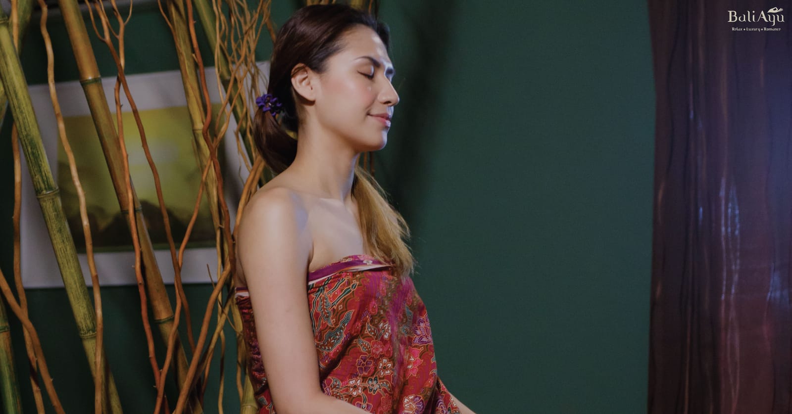 A guest in a batik sarong at BaliAyu